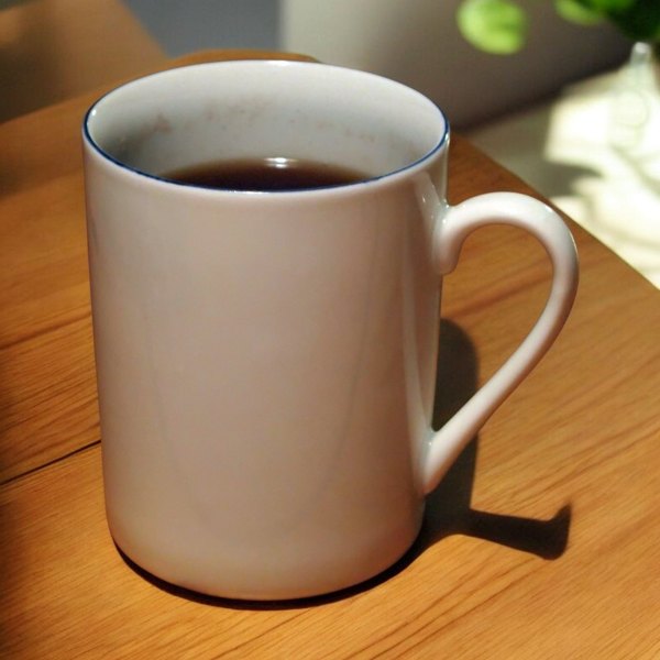 Ceramic mug: Styled tabletop background