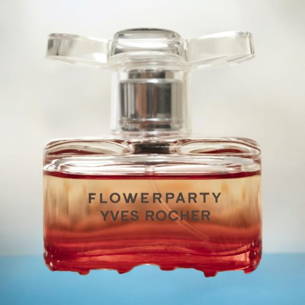 Glass perfume bottle: Clean studio background