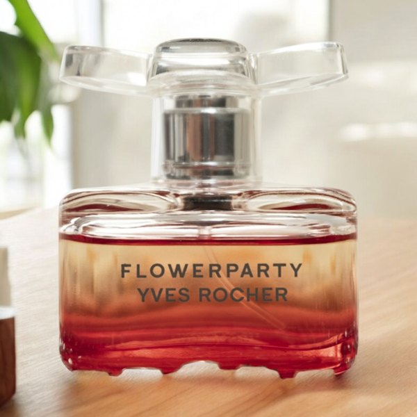 Glass perfume bottle: Styled tabletop background